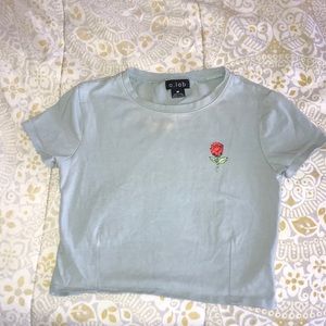 Light blue zumiez t-shirt with rose